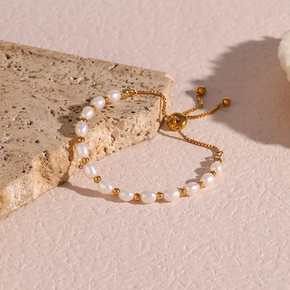 Elegant Pärl och Guld Armband