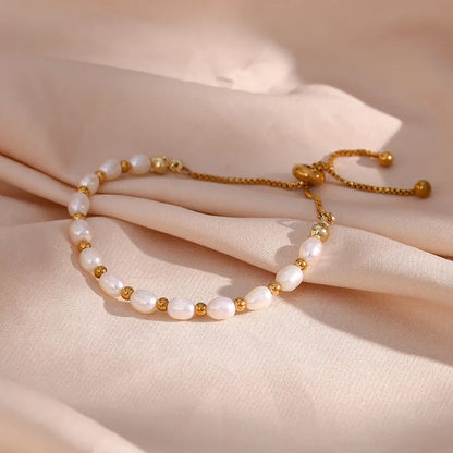 Elegant Pärl och Guld Armband